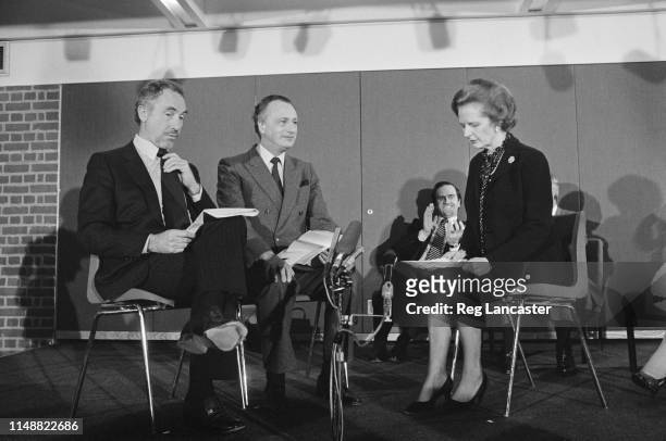 British Prime Minister Margaret Thatcher performing a short sketch with Paul Eddington and Nigel Hawthorne at a ceremony where the writers were...