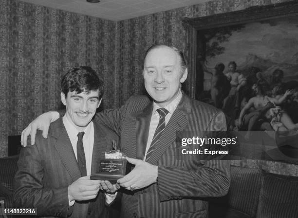 Irish boxer Barry McGuigan presented with the Geoffrey Simpson Award by the Boxing Writers Club for 1983 Best Young Boxer of the Year, UK, 19th...