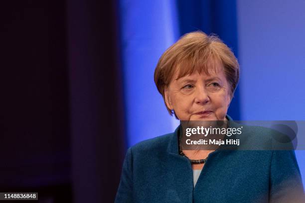 German Chancellor Angela Merkel speaks during a town-hall style meeting with locals to discuss Germany's constitution on May 13, 2019 in Wuppertal,...