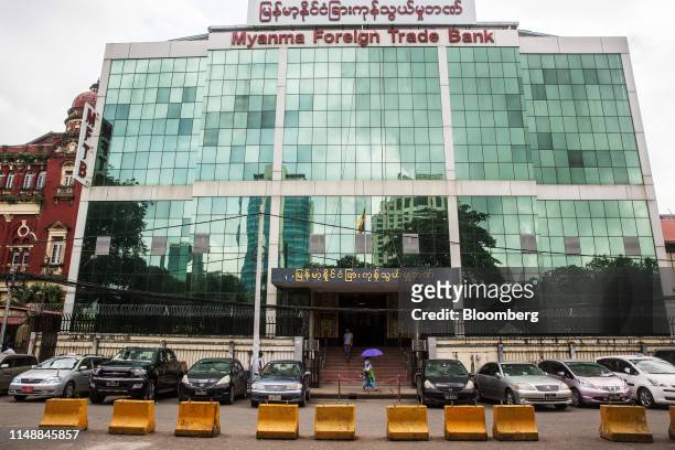 Signage for the Myanma Foreign Trade Bank is displayed at the bank's headquarters in Yangon, Myanmar, on Monday, Sept. 3, 2018. Though still one of...