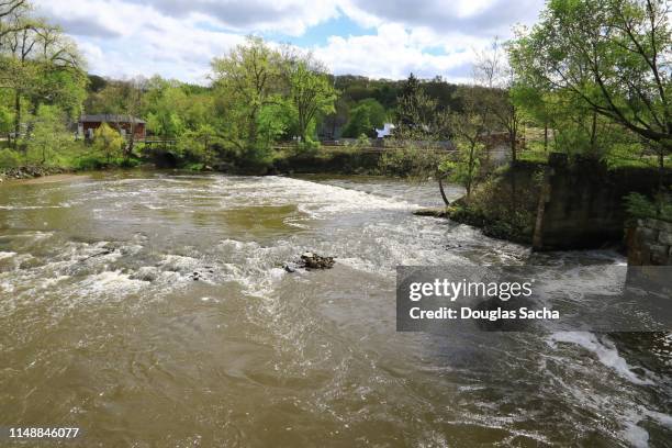 flowing river in a rural setting - cuyahoga river stock pictures, royalty-free photos & images