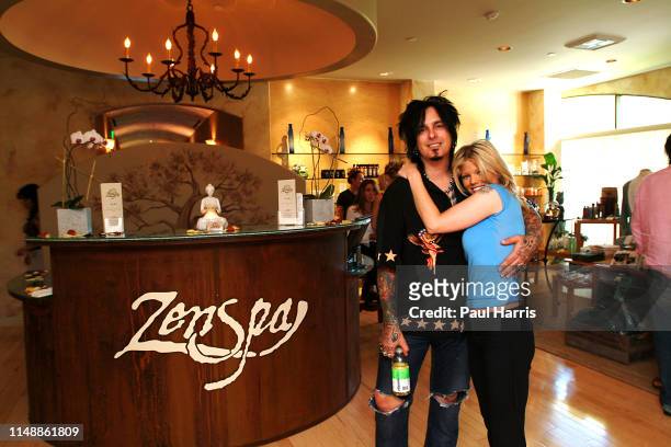 Ex Baywatch Actress Donna D'Errico with her husband Motley Crue Bassist Nikki Sixx has opened a day Spa April 26, 2003 called Zen Spa in Calabasas,...
