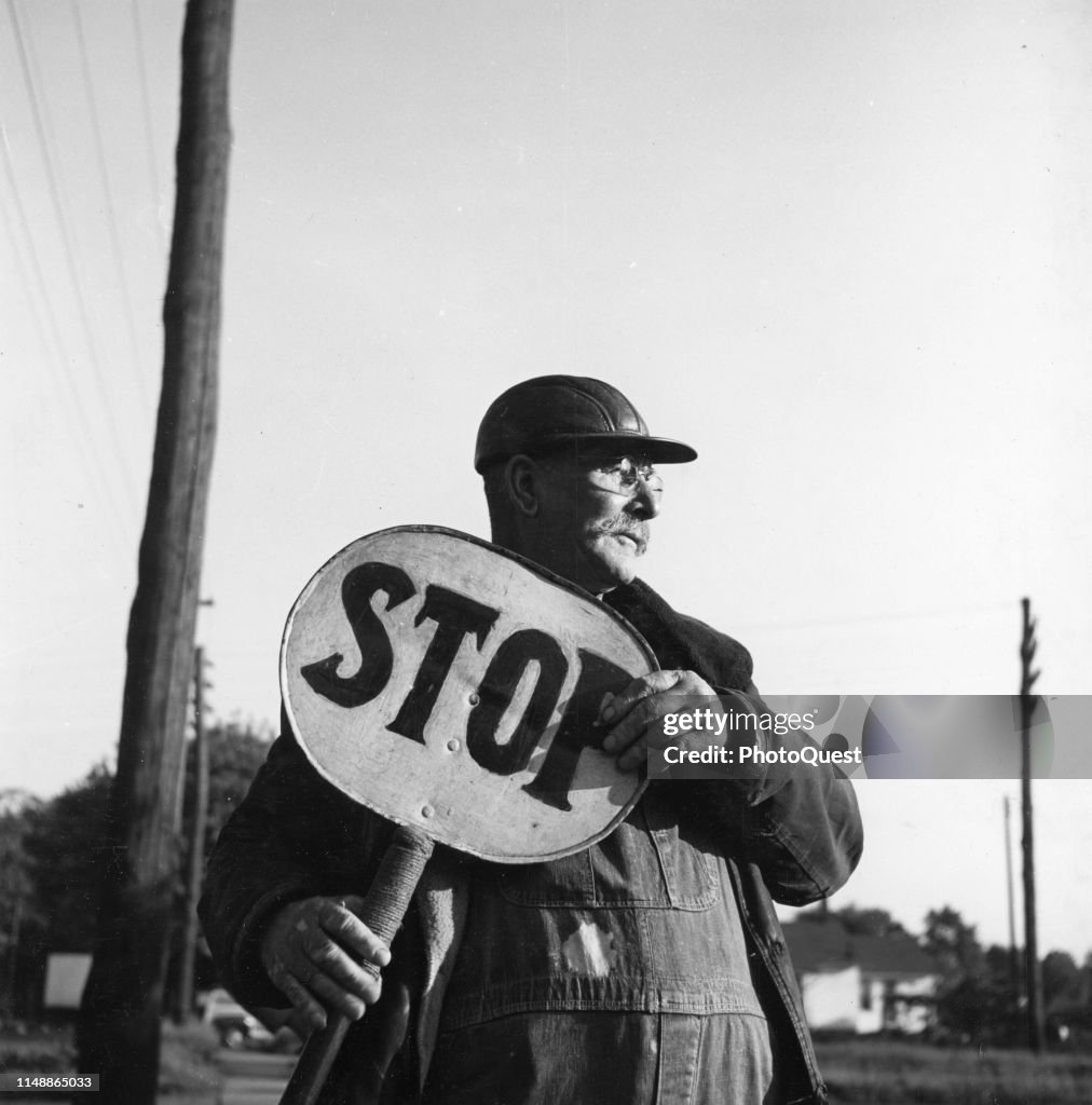 Stop Sign At Railroad Crossing