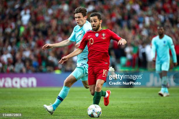 Bernardo Silva of Portugal and Manchester City and Marten de Roon of Netherlands and Atalanta Bergamasca Calcio during the UEFA Nations League Final...