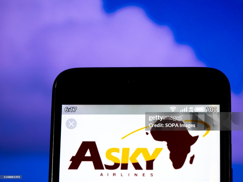 In this photo illustration a ASKY Airlines logo seen...
