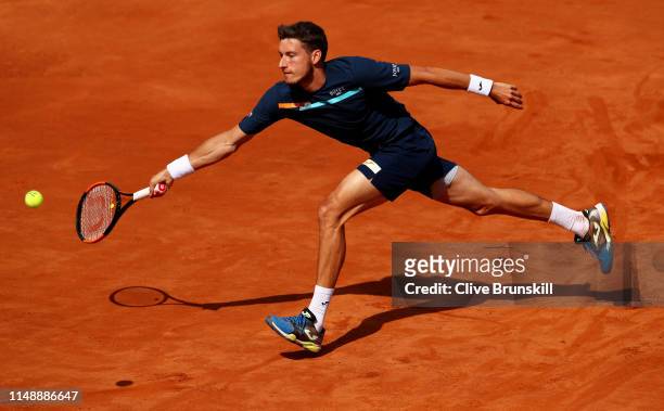 Pablo Carreno Busta of Spain plays a forehand against Denis Shapovalov of Canada in their first round match during day two of the International BNL...