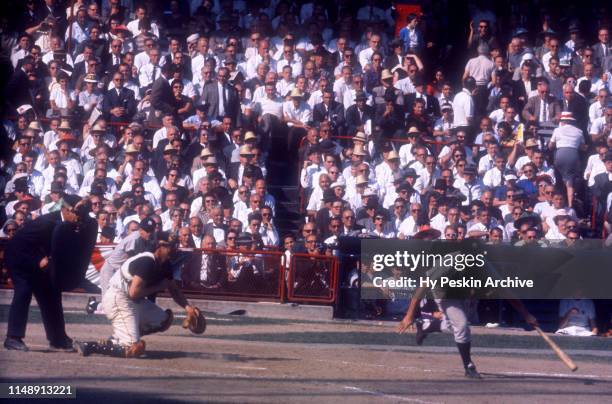 Bobby Richardson of the New York Yankees fouls the ball off the bunt attempt during Game 6 of the 1960 World Series against the Pittsburgh Pirates on...