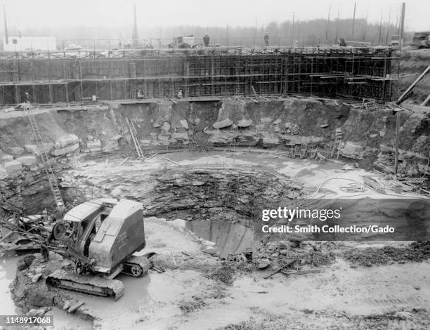 Plum Brook Reactor Facility construction crew excavates a hole in the ground for the pressure tank, Plum Brook Station, John H. Glenn Research Center...