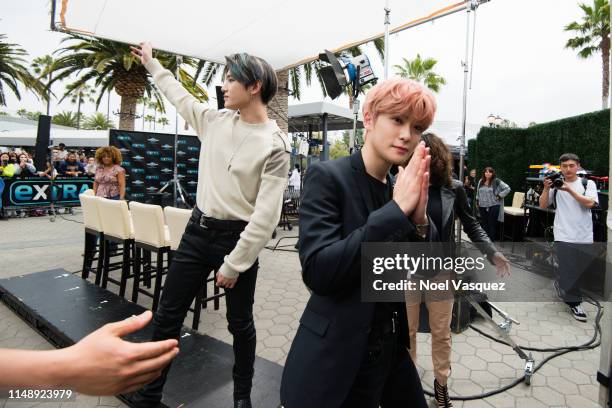Taeyong and Jaehyun of NCT 127 visit "Extra"at Universal Studios Hollywood on May 13, 2019 in Universal City, California.