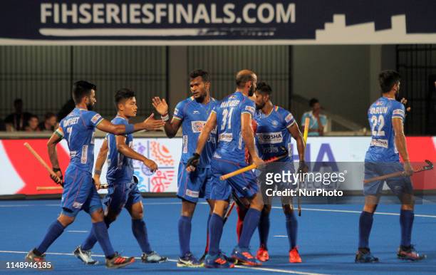 India players celebrate after score a goal during the hockey World Series Finals 2019 league round match between India and Uzbekistan at the Kalinga...