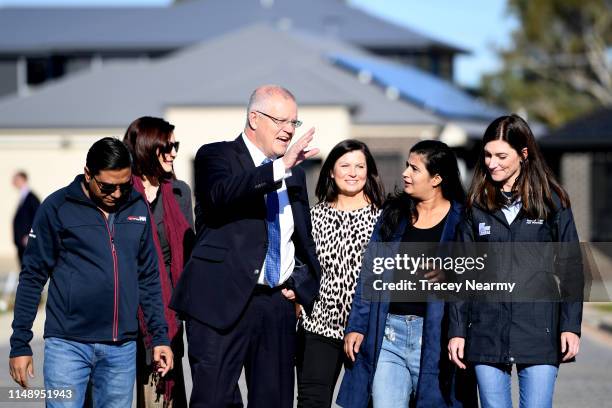 Prime Minister Scott Morrison with his wife Jenny Morrison and the Federal Member for Boothby Nicolle Flint arrive at a building site in Oaklands...