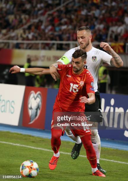 June 10: Marko Arnautovic of Austria and Egzon Bejtulai of North Macedonia during the UEFA Euro 2020 qualifier match between North Macedonia and...