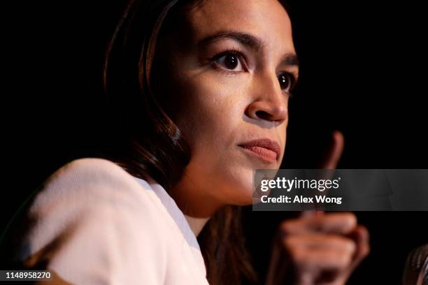 Rep. Alexandria Ocasio-Cortez speaks during a rally at Howard University May 13, 2019 in Washington, DC. The Sunrise Movement held an event for the...