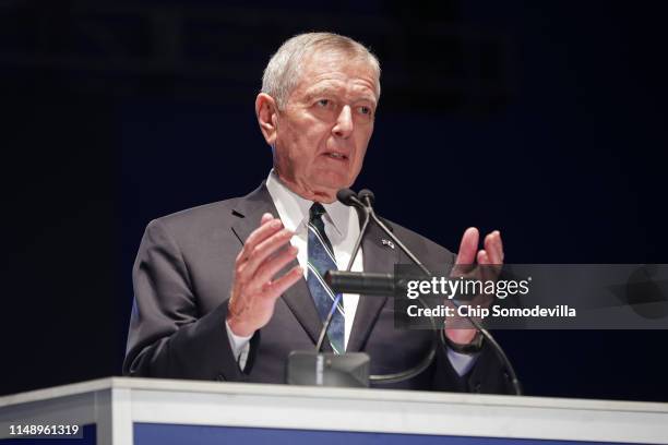 Former U.S. Attorney General John Ashcroft delivers remarks during the National Police Week 31st Annual Candlelight Vigil on the National Mall May...