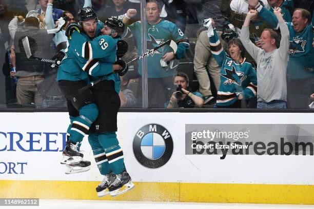 Logan Couture of the San Jose Sharks celebrates his goal against the St. Louis Blues with Timo Meier in Game Two of the Western Conference Final...