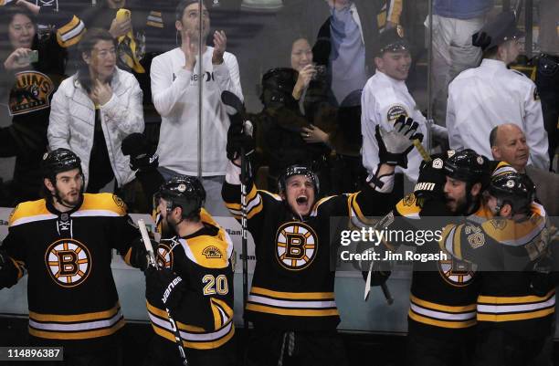 Adam McQuaid, Daniel Paille, Tyler Seguin, Milan Lucic and Mark Recchi of the Boston Bruins celebrate their 1 to 0 victory over the Tampa Bay...