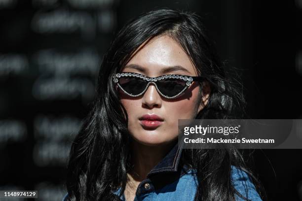 Angie Rui wearing Les Specs sunglasses at Mercedes-Benz Fashion Week Resort 20 Collections on May 14, 2019 in Sydney, Australia.