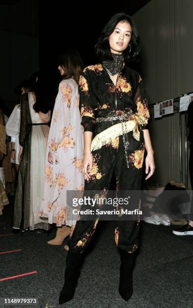 Model prepares backstage ahead of the We Are Kindred show at Mercedes-Benz Fashion Week Resort 20 Collections at Carriageworks on May 14, 2019 in...