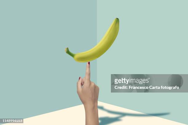 healthy lifestyle - banana woman photos et images de collection