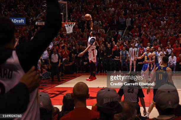 Norman Powell of the Toronto Raptors dunks the ball against the Golden State Warriors during Game Five of the NBA Finals on June 10, 2019 at...
