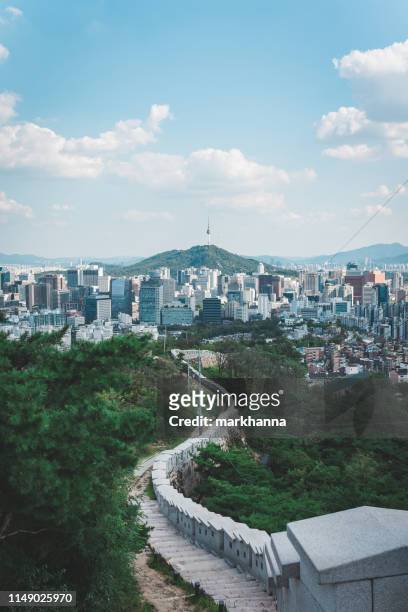cityscape and n seoul tower on namsan mountain, seoul, south korea - namsan seoul stock pictures, royalty-free photos & images
