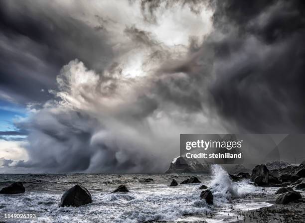 polar low approaching beach, lofoten, nordland, norway - extreme weather norway stock pictures, royalty-free photos & images