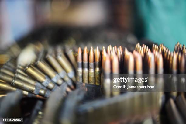 close-up of bullets for an ak-47 - arma de fogo imagens e fotografias de stock