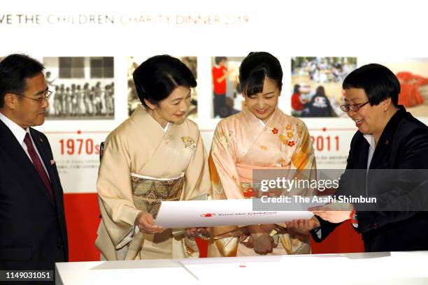 Crown Princess Kiko of Akishino and Princess Kako of Akishino visit the Save the Children exhibition on May 13, 2019 in Tokyo, Japan.