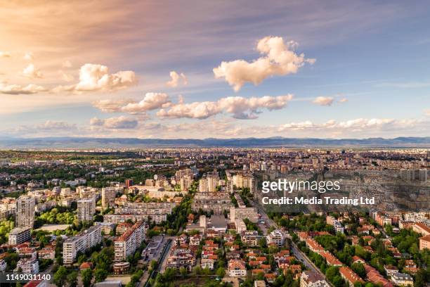 dramatic sunset over sofia, bulgaria during springtime cityscape - bulgaria stock pictures, royalty-free photos & images