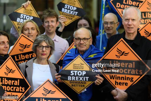 Liberal Democrat supporters wait for the arrival of MPs Jo Swinson and Ed Davey for a photocall to launch a new poster campaign, attacking Labour...