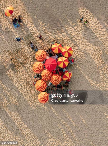 beach from above, summer crowd - angola drone stock pictures, royalty-free photos & images