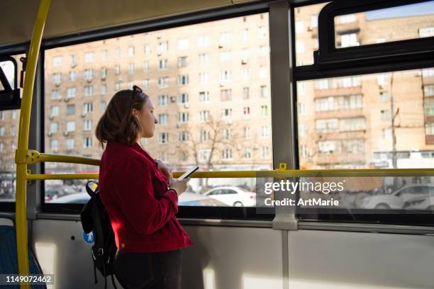 teen girl travelling by bus - bus window stock pictures, royalty-free photos & images