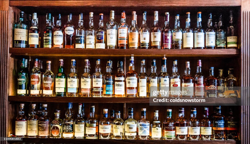 Large selection of Scottish malt whisky at the bar