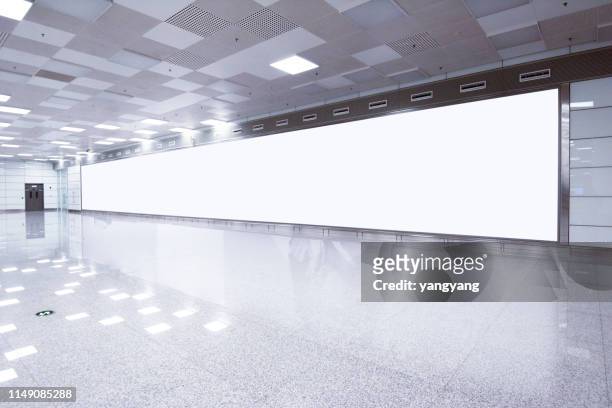 mockup image of blank billboard white screen posters and led in the subway station for advertising - hong kong advertising stock pictures, royalty-free photos & images