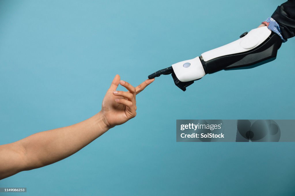 Human and Robotic Hand Touching