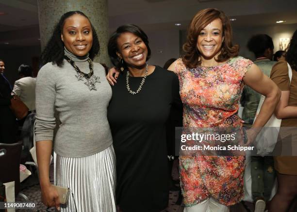 Midwin Charles, Diana St. Louis, and Kwanza R. Butler attend the reception for the 32nd Anniversary Celebrating Women Breakfast at Marriott Marquis...