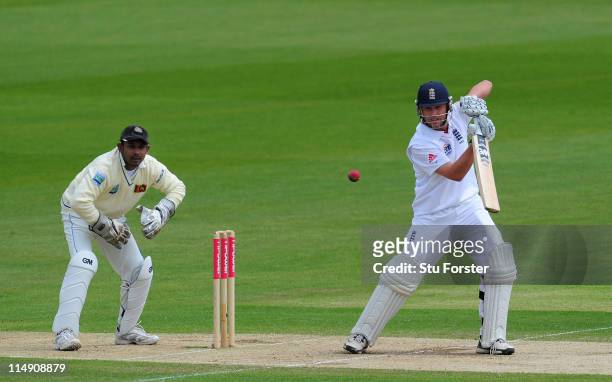England batsman Jonathan Trott picks up some runs watched by Sri Lanka wicketkeeper Prasanna Jayawardene during day three of the 1st npower test...