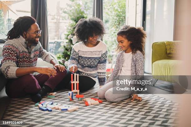 quality family time - jenga stock pictures, royalty-free photos & images