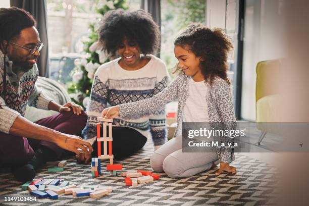 quality family time - jenga stock pictures, royalty-free photos & images