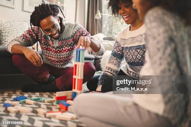 quality family time - jenga stock pictures, royalty-free photos & images