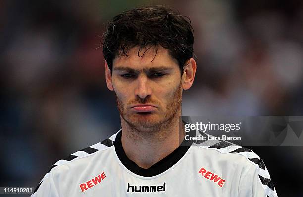 Goalkeeper Henning Fritz of Rhein Neckar looks dejected during the EHF Final Four semi final match between Rhein-Neckar Loewen and FC Barcelona at...