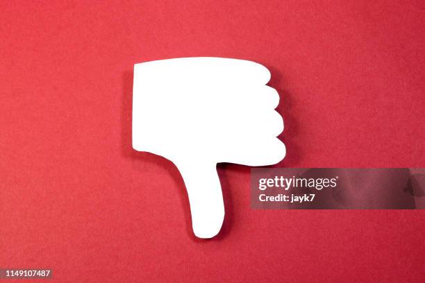 thumbs down - dismissal stock pictures, royalty-free photos & images