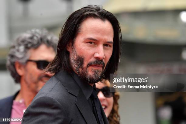 Keanu Reeves arrives for his handprint ceremony at the TCL Chinese Theatre IMAX forecourt on May 14, 2019 in Hollywood, California.