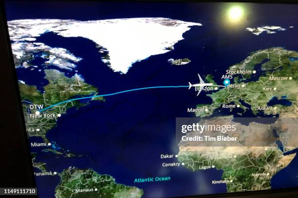 travel map on airplane - amsterdam map stock pictures, royalty-free photos & images