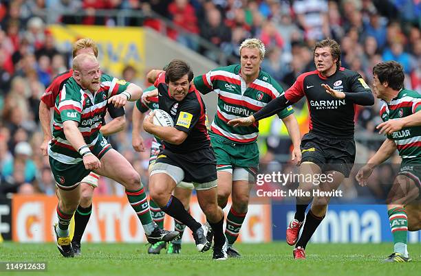 Schalk Brits of Saracens breaks past Dan Cole of Leicester Tigers during the AVIVA Premiership Final between Leicester Tigers and Saracens at...