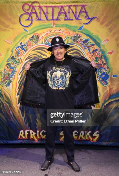 Recording artist Carlos Santana poses during a listening event for his upcoming album "Africa Speaks" featuring singer Buika at the House of Blues...