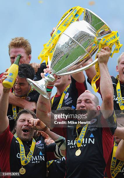 Captain Steve Borthwick of Saracens lifts the trophy after the AVIVA Premiership Final between Leicester Tigers and Saracens at Twickenham Stadium on...