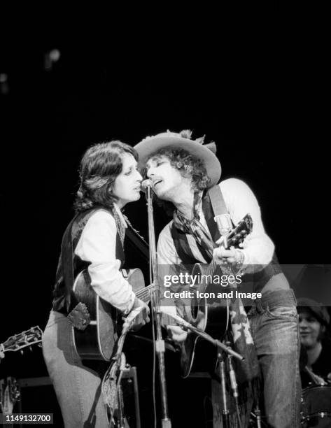 American singer-songwriter, musician and activist, Joan Baez, and American singer-songwriter, multi-instrumentalist and author, Bob Dylan, perform in...