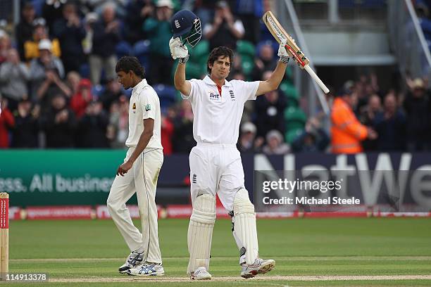 Alastair Cook of England celebrates reaching his century during day three of the 1st npower test match between England and Sri Lanka at the Swalec...