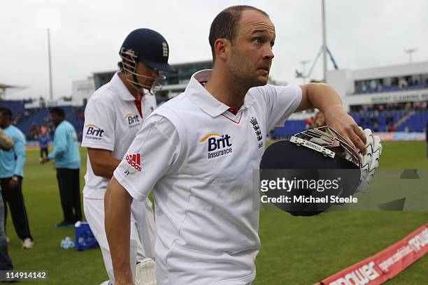 Jonathan Trott on 125 not out and Alastair Cook of England not out 129 walk off the pitch at the close of play on day three of the 1st npower test...